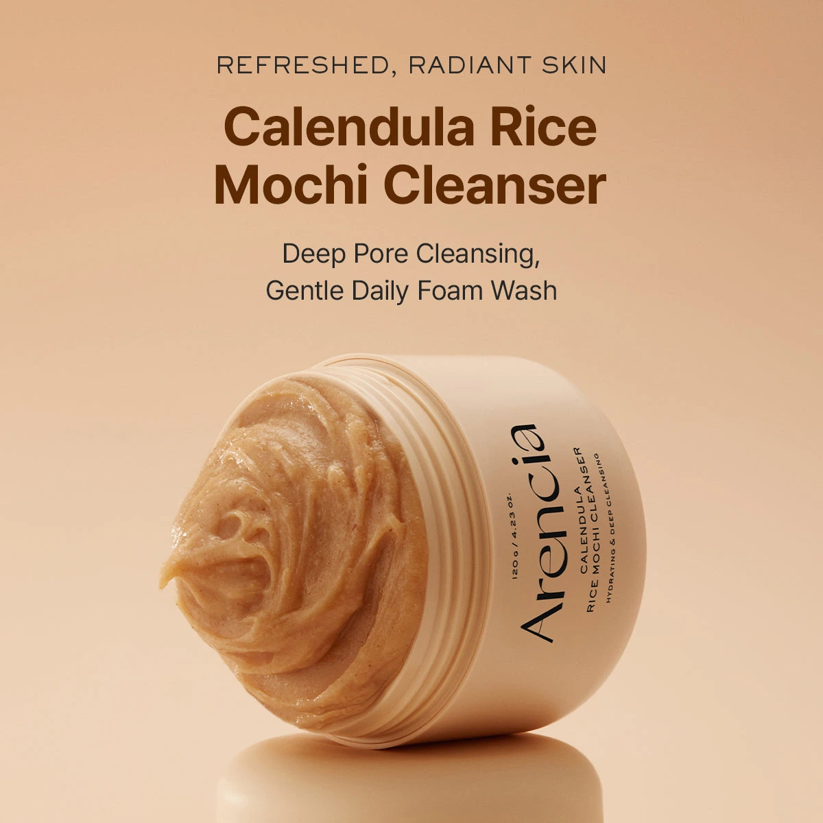 Arencia Calendula Rice Mochi Cleanser jar with its stretchy mochi texture
