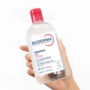 Bioderma Sensibio H2O 500ml bottle held in hand, front label showing Made in France