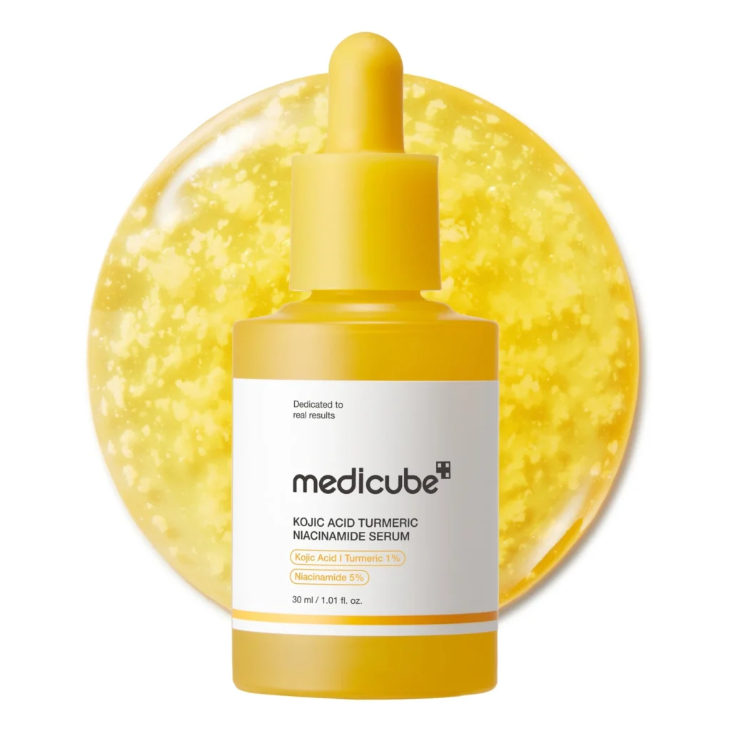 Medicube Kojic Acid Turmeric Serum 30ml bottle with suspended yellow capsules