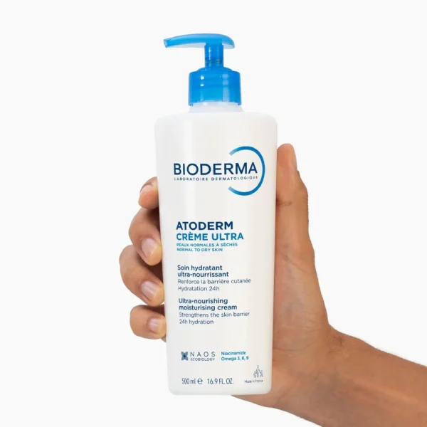 Hand holding Bioderma Atoderm Ultra Cream 500ml