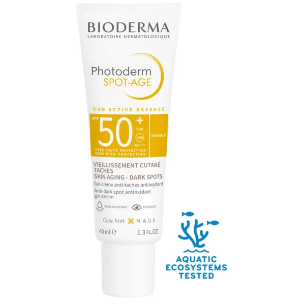 Hand applying Bioderma Photoderm Spot-Age SPF 50+ sunscreen