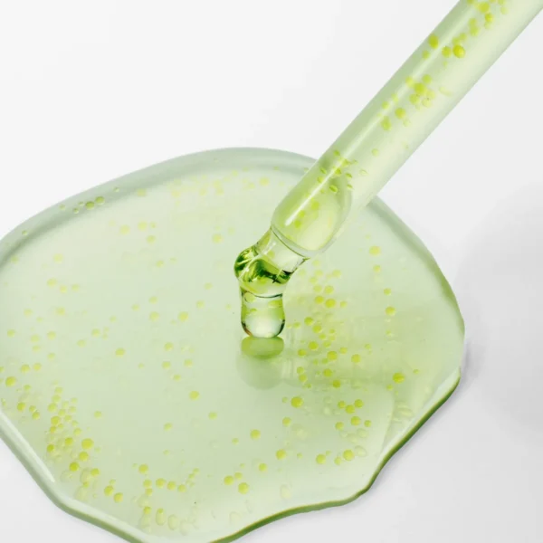 Purito Azelaic Acid 10 Kojic Serum dropper and green serum texture