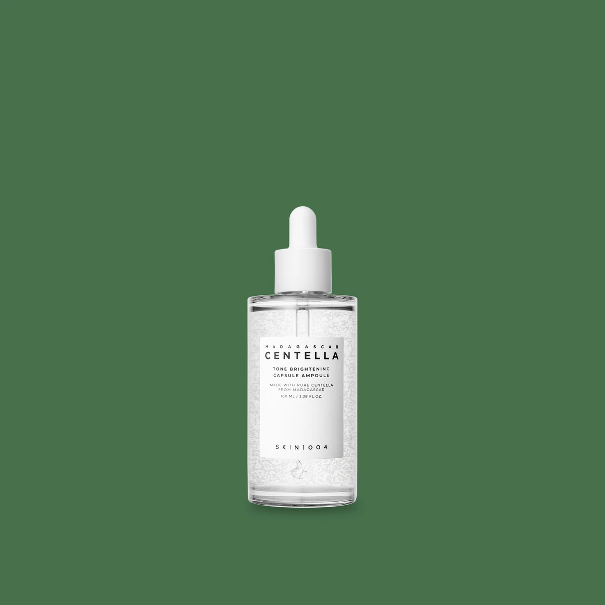 SKIN1004 Centella Tone Brightening Ampoule clear bottle with white brightening capsules