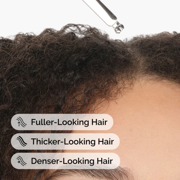 Applying The Ordinary Multi-Peptide Serum for Hair Density to clean dry scalp