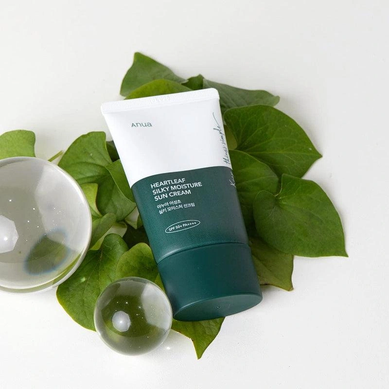 Anua Heartleaf Silky Sun Cream with fresh heartleaf leaves