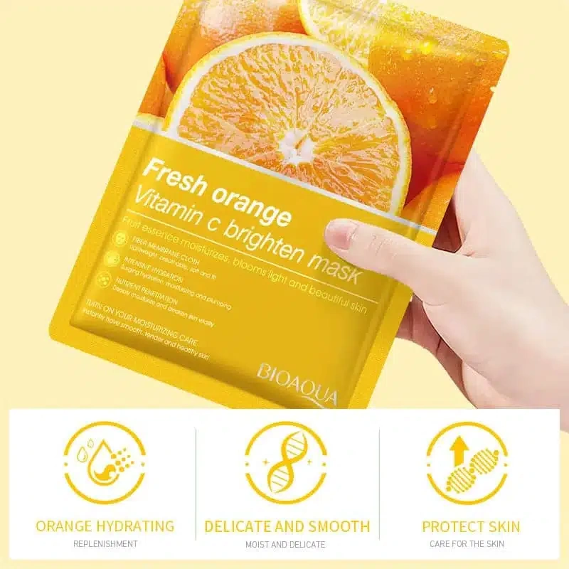 Bioaqua Vitamin C Orange Sheet Mask 25g - hand holding orange mask sachet with benefit icons