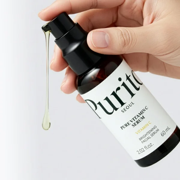 Purito Pure Vitamin C Serum pump in hand