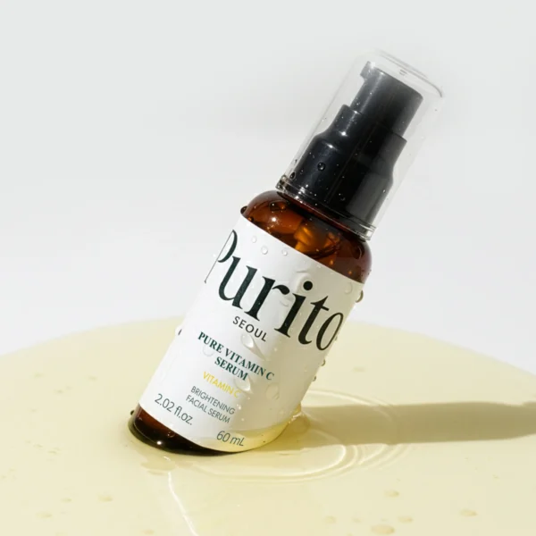 Purito Pure Vitamin C Serum bottle on texture