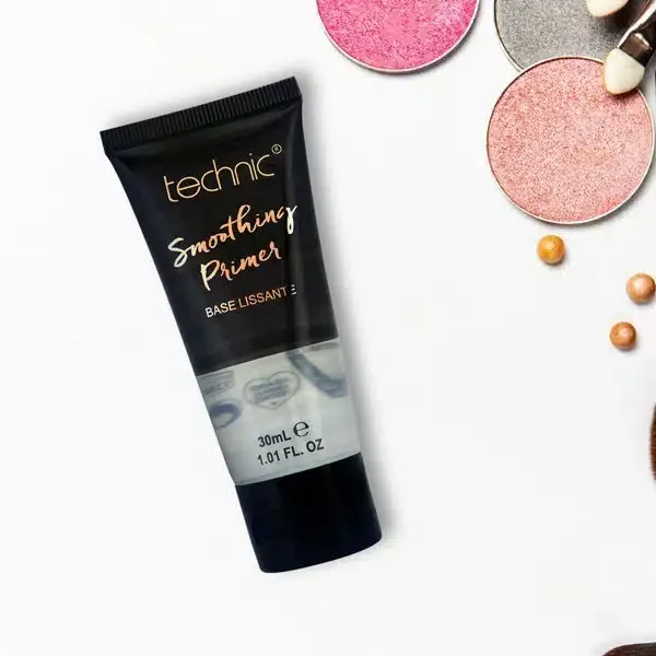 Technic Smoothing Face Primer tube styled with eyeshadow pans